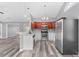 Modern kitchen with cherry wood cabinets and stainless steel appliances at 248 Hickory Springs Ct., Conway, SC 29527