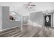 Spacious living room with hardwood floors and access to kitchen at 248 Hickory Springs Ct., Conway, SC 29527