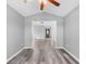 Open living area with hardwood floors and view to entryway at 248 Hickory Springs Ct., Conway, SC 29527