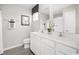 New bathroom features double sinks, generous counter space, and bright neutral walls at 288 Myrtle Meadows Dr # 505E, Conway, SC 29526