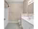 Bright bathroom with white vanity, tile floors, and a shower-tub combination at 4672 Lightkeepers Way # 50-E, Little River, SC 29566
