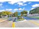 Welcoming entrance to a beautiful waterfront community, featuring lush landscaping at 4672 Lightkeepers Way # 50-E, Little River, SC 29566