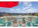 Relaxing balcony with waterfront views and comfy seating at 47 Isle Of Palms Dr., Murrells Inlet, SC 29576
