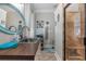 Modern bathroom with a walk-in shower and a stylish vanity at 47 Isle Of Palms Dr., Murrells Inlet, SC 29576