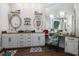 Double vanity bathroom with granite countertops and decorative mirrors at 47 Isle Of Palms Dr., Murrells Inlet, SC 29576