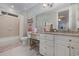 Bathroom with a toilet, shower, and vanity with granite top at 47 Isle Of Palms Dr., Murrells Inlet, SC 29576