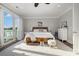 Bedroom with queen bed, access to balcony, and soft color scheme at 47 Isle Of Palms Dr., Murrells Inlet, SC 29576