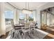 Dining room with water views, featuring a large table and comfortable seating at 47 Isle Of Palms Dr., Murrells Inlet, SC 29576