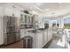 Well-equipped kitchen featuring stainless steel appliances and white cabinetry at 47 Isle Of Palms Dr., Murrells Inlet, SC 29576