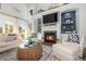 Living room with fireplace, built-in shelving and a cozy seating arrangement at 47 Isle Of Palms Dr., Murrells Inlet, SC 29576