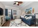 Comfortable living room with a sofa and coastal-themed art at 47 Isle Of Palms Dr., Murrells Inlet, SC 29576