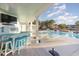 Covered patio with teal bar, comfortable seating, and TV at 47 Isle Of Palms Dr., Murrells Inlet, SC 29576