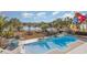 Relaxing pool area with lake view, creating a peaceful atmosphere at 47 Isle Of Palms Dr., Murrells Inlet, SC 29576