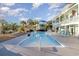 Inviting pool with lounge chairs and a spacious patio at 47 Isle Of Palms Dr., Murrells Inlet, SC 29576