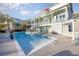 Resort style pool with patio furniture and a pergola at 47 Isle Of Palms Dr., Murrells Inlet, SC 29576