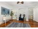 Charming sitting area with hardwood floors and a comfy chair at 47 Isle Of Palms Dr., Murrells Inlet, SC 29576