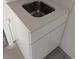 White vanity with single sink and quartz countertop at 48 Furman Ln., Pawleys Island, SC 29585