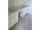 Double vanity with white cabinets and quartz countertops at 48 Furman Ln., Pawleys Island, SC 29585
