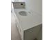 Modern bathroom vanity with white countertop and round sink at 48 Furman Ln., Pawleys Island, SC 29585