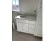 White vanity with single sink and quartz countertop at 48 Furman Ln., Pawleys Island, SC 29585
