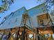 Elevated two-story house with light blue and white siding under construction at 48 Furman Ln., Pawleys Island, SC 29585