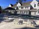 Community pool with lounge chairs and gazebo at 500 Fairway Village Dr. # 8E, Myrtle Beach, SC 29588