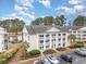 Two-story condo building with ample parking and pond views at 5010 Windsor Green Way # 301, Myrtle Beach, SC 29579