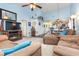 Open living space with vaulted ceiling, fireplace and access to kitchen at 5010 Windsor Green Way # 301, Myrtle Beach, SC 29579