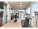 Screened balcony with patio furniture and community view at 5010 Windsor Green Way # 301, Myrtle Beach, SC 29579