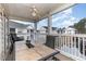 Spacious screened balcony with seating and scenic view at 5010 Windsor Green Way # 301, Myrtle Beach, SC 29579