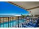 Relaxing balcony with ocean and pool views at 517 S Ocean Blvd. # 105, North Myrtle Beach, SC 29582