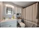 Clean bathroom with a white vanity and shower at 517 S Ocean Blvd. # 105, North Myrtle Beach, SC 29582