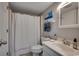 Simple bathroom with a single sink and shower at 517 S Ocean Blvd. # 105, North Myrtle Beach, SC 29582