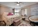 Bedroom with a full-size bed and ocean-themed decor at 517 S Ocean Blvd. # 105, North Myrtle Beach, SC 29582