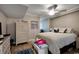 Bedroom with a queen-size bed and wicker dresser at 517 S Ocean Blvd. # 105, North Myrtle Beach, SC 29582