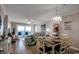 Open dining area with kitchen access and ocean view at 517 S Ocean Blvd. # 105, North Myrtle Beach, SC 29582