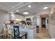 Modern kitchen with granite countertops and white cabinets at 517 S Ocean Blvd. # 105, North Myrtle Beach, SC 29582