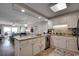 Updated kitchen with granite counters and white cabinets at 517 S Ocean Blvd. # 105, North Myrtle Beach, SC 29582