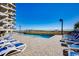 Resort-style pool with plenty of lounge chairs and ocean view at 517 S Ocean Blvd. # 105, North Myrtle Beach, SC 29582