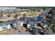 Aerial view showing condo building near a golf course and pond at 517 White River Ct. # 22A, Myrtle Beach, SC 29579