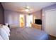 Bedroom with king bed, ceiling fan, and large closet at 517 White River Ct. # 22A, Myrtle Beach, SC 29579