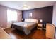 Spacious bedroom with a king-size bed and ceiling fan at 517 White River Ct. # 22A, Myrtle Beach, SC 29579