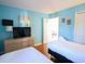 Bedroom with two twin beds, dresser, and TV at 517 White River Ct. # 22A, Myrtle Beach, SC 29579