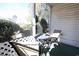 Screened-in patio with small table and chairs at 517 White River Ct. # 22A, Myrtle Beach, SC 29579