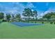 Community tennis court with green and blue surface at 517 White River Ct. # 22A, Myrtle Beach, SC 29579