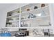 Open shelving with decorative items and dishes at 5709 N Ocean Blvd. N # 202, North Myrtle Beach, SC 29582