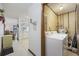 Convenient laundry room with washer and dryer at 5709 N Ocean Blvd. N # 202, North Myrtle Beach, SC 29582