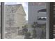 Partial ocean view from window at 5709 N Ocean Blvd. N # 202, North Myrtle Beach, SC 29582