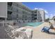 Inviting pool area with lounge chairs at 5709 N Ocean Blvd. N # 202, North Myrtle Beach, SC 29582