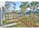 Small, fenced backyard with landscaping and walkway at 600 48Th Ave. S # 403, North Myrtle Beach, SC 29582